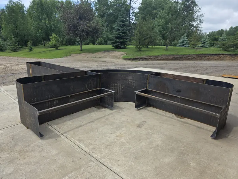 Custom modular Corten steel planter and bench system fabricated at the shop