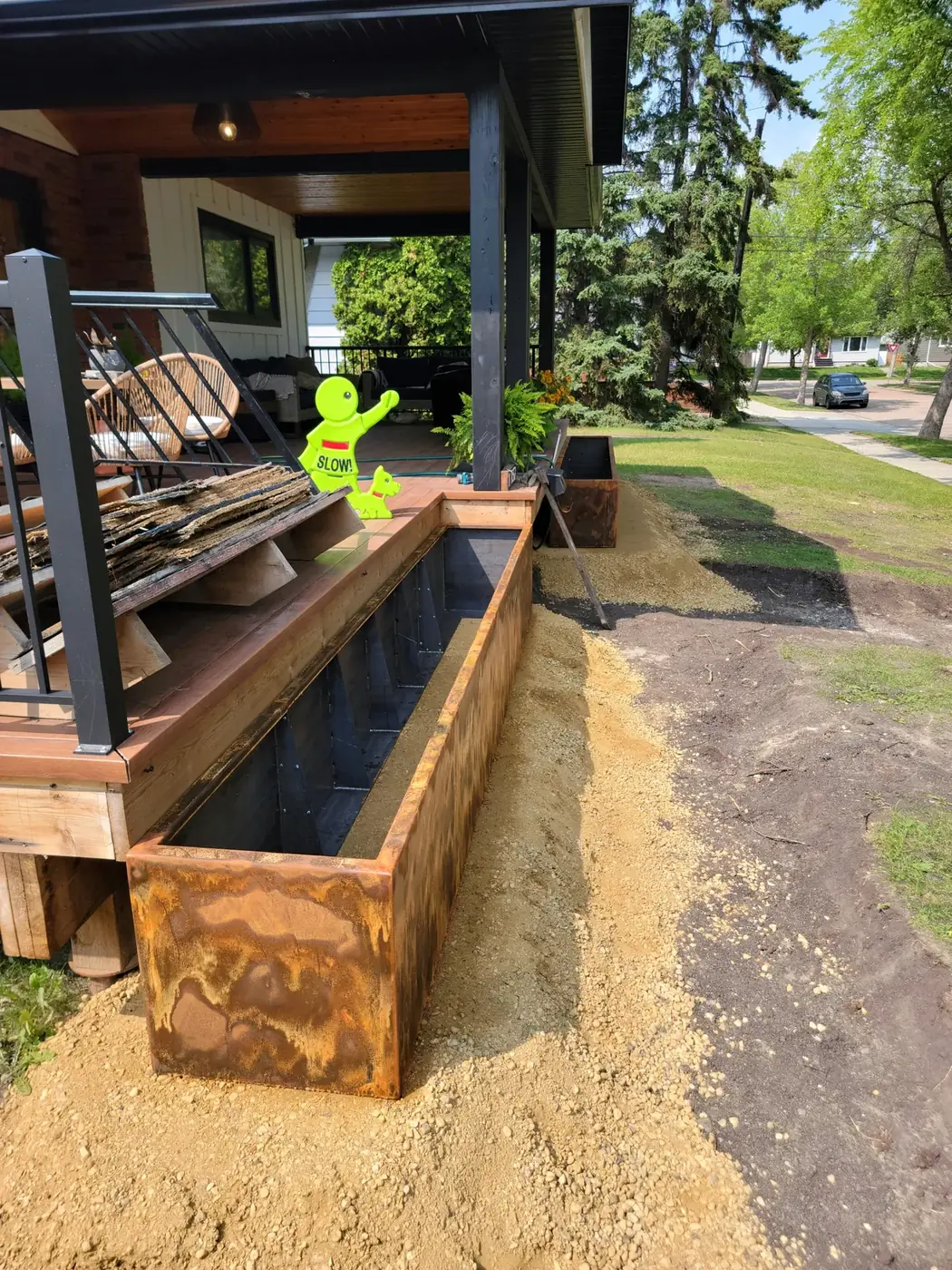 Detail of a Corten planter box showing weathering-steel patina
